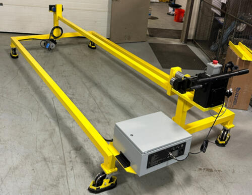 A Yellow Trunnion Cart on a concrete floor.